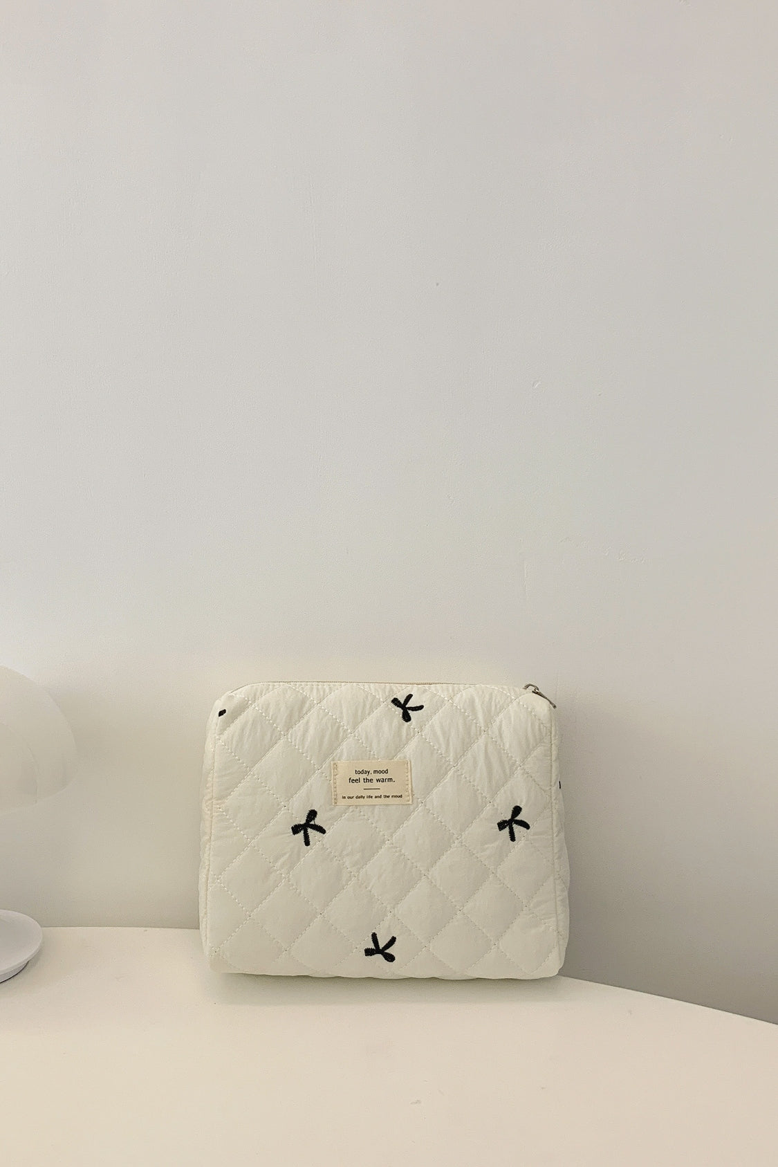 Bow Embroidered Quilted Storage Bag